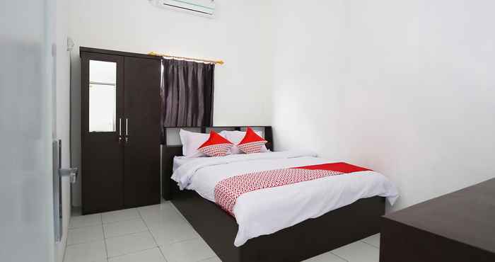 Bedroom OYO 2882 Borneo Residence