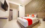 Kamar Tidur 3 Enfaza Guesthouse Syariah