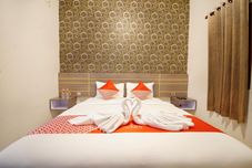 Bedroom Enfaza Guesthouse Syariah