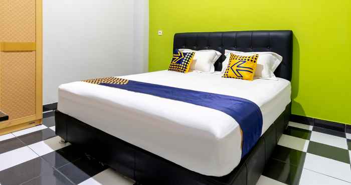 Kamar Tidur SPOT ON 2272 Citra Arcade Residence Syariah