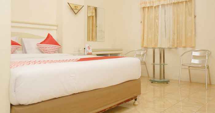 Kamar Tidur OYO 2870 Wisma Prima Makassar