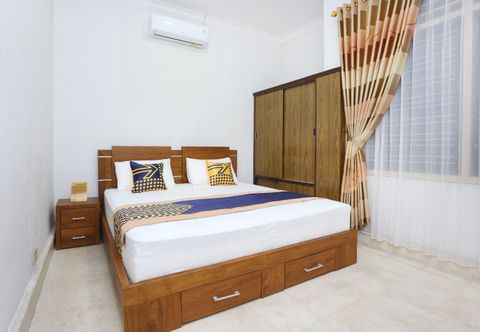 Bedroom OYO 2268 Tim-tim Homestay Syariah