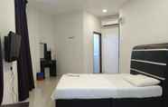 Kamar Tidur 3 OYO 89792 Hamriz Hotel