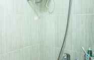 In-room Bathroom 7 Golom 22 by Malioboro City Apartment