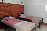 Bedroom SPOT ON 2829 Hotel Arjuna Syariah