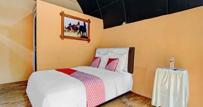 Kamar Tidur OYO 90474 Caravan Camp