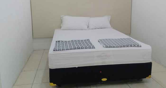 Bedroom OYO 3089 Al Mustaqim Homestay Family