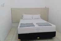 Kamar Tidur OYO 3089 Al Mustaqim Homestay Family