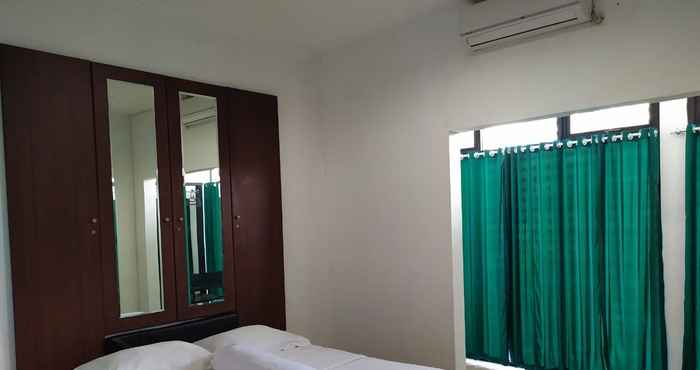 Kamar Tidur OYO 2951 Graha HT Sumantri Residence