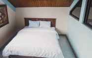 Kamar Tidur 6 Boutique Flamboyan Homestay Syariah