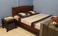 Kamar Tidur 2 SPOT ON 89920 Muwaffaq Inn