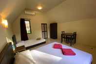 Bedroom OYO 89896 Sedili Inn Resort