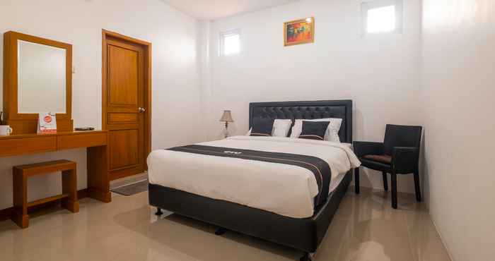 Kamar Tidur OYO 2939 Guest House Rosa Near RS Sartika Asih