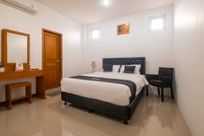 Kamar Tidur OYO 2939 Guest House Rosa Near RS Sartika Asih