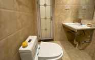 In-room Bathroom 4 SPOT ON 89947 Mu Yu