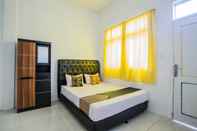 Kamar Tidur SPOT ON 2780 Rumah Tamu Ei Guest House Syariah