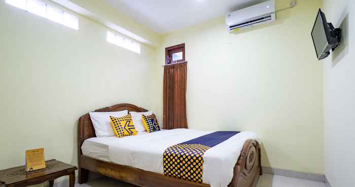 Bedroom SPOT ON 2881 Nabila Residence