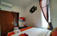 Kamar Tidur 6 MHS Inn Syariah Hotel