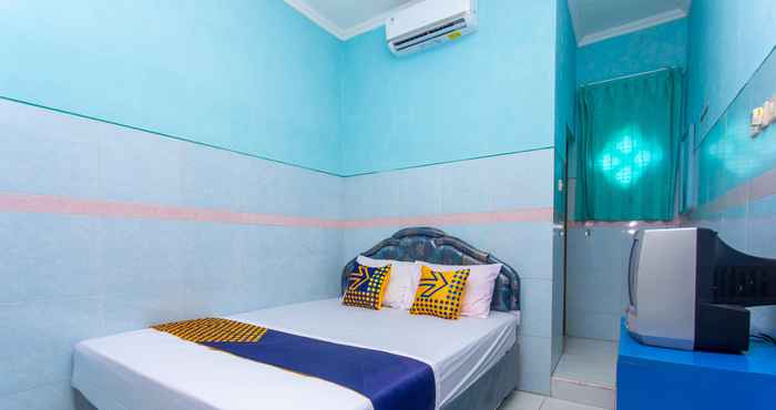 Bedroom SPOT ON 2871 Hotel Budi
