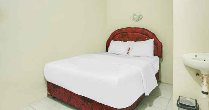 ห้องนอน OYO 2872 Garuda Guest House