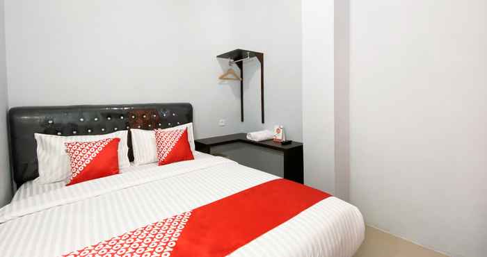 Kamar Tidur OYO 3160 Guesthouse Pagi Sore Syariah