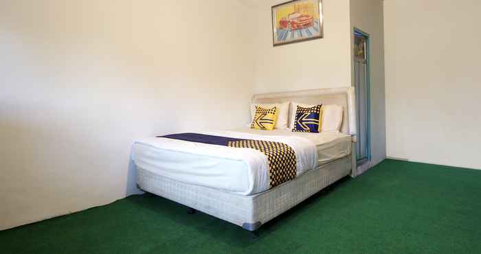 Bedroom SPOT ON 2758 Zayn Homestay Syariah