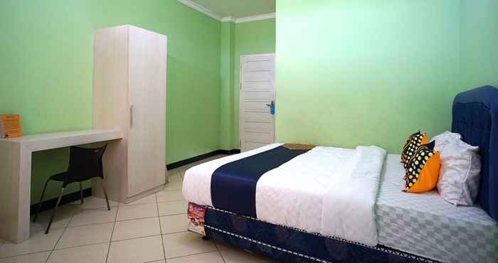 Bedroom SPOT ON 2729 Marzan Syariah Residence