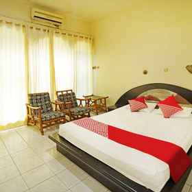Bedroom 1 OYO 3201 Hotel Rian Palembang, Khách sạn PT. Kimia Farma Trading And Distribution