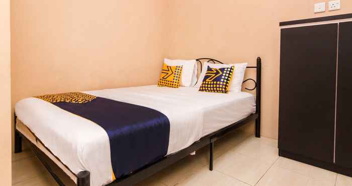 Kamar Tidur SPOT ON 2755 Zainab Homestay Syariah