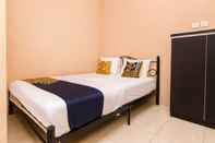 Kamar Tidur SPOT ON 2755 Zainab Homestay Syariah