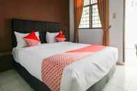 ห้องนอน SUPER OYO 2940 Papakoel Guest House