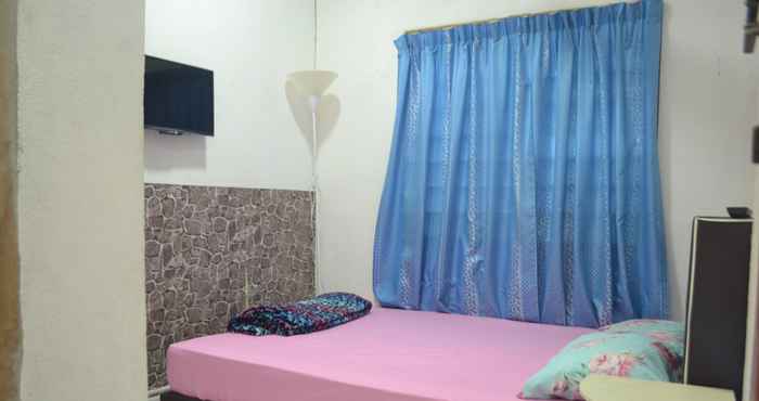 Bedroom SPOT ON 89821 Batu Maung Sempoi Inn And Cafe