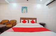 Kamar Tidur 5 OYO 89987 Nautilus Bay Home Inn