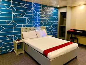 Kamar Tidur 4 ACME Inn Subic