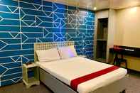 Bedroom ACME Inn Subic