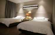 Kamar Tidur 5 Subic Bay Travelers Hotel & Event Center