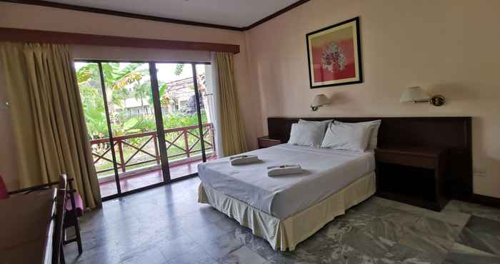Phòng ngủ OYO 89972 Borneo Paradise Beach Hotel