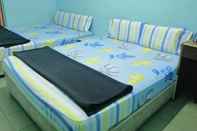 Kamar Tidur SPOT ON 89989 Wispering Hotel