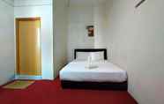 Bedroom 3 SPOT ON 89994 Rz Gold Hotel