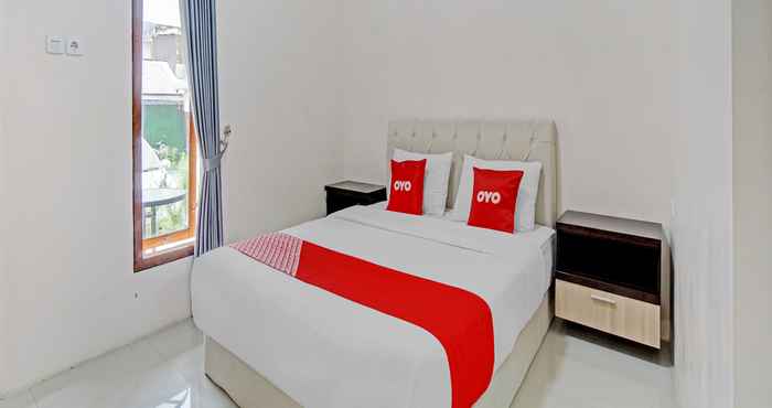 ห้องนอน OYO 90736 Hikari Guest House