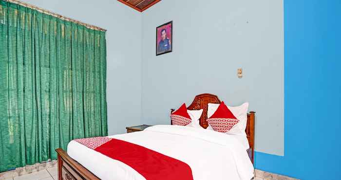 Bedroom OYO 3205 Penginapan Mikial Ismi Kayuagung