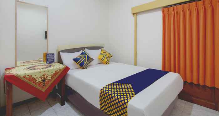 Kamar Tidur SPOT ON 3218 Bee Palm Family Syariah