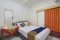 Kamar Tidur SPOT ON 3218 Bee Palm Family Syariah