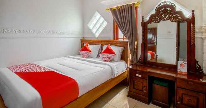 Kamar Tidur OYO 3289 Penginapan Dita Family