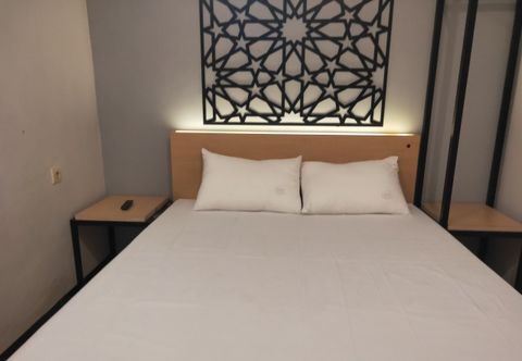 Bedroom OYO 3219 Kristian Residence