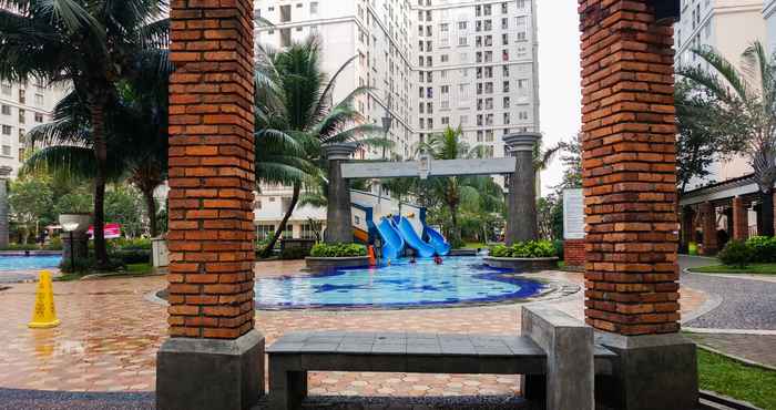 Kolam Renang 2BR Spacious Apartment at Green Palace Apartment with Lake View By Travelio