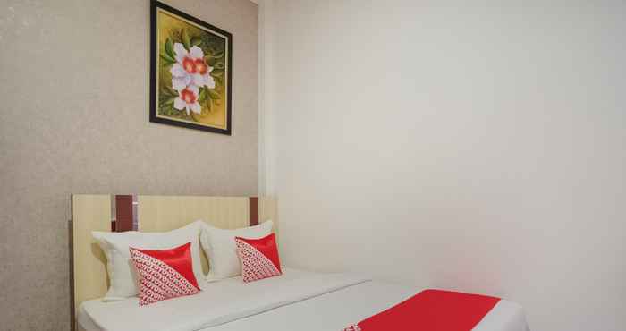 Bedroom OYO 3225 Alinia Guest House Syariah