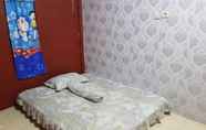 Bedroom 2 OYO Life 2985 Kost Devira