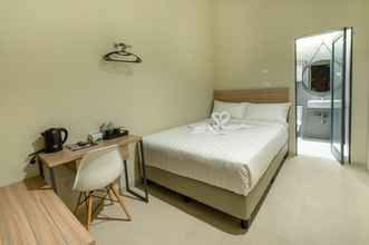 Kamar Tidur 4 Front One Harvest Hotel Wonosobo