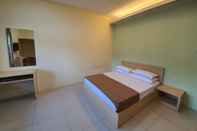 Kamar Tidur SPOT ON 90025 Sr Valley Hotel